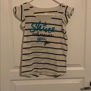 Cream and black tee shirt